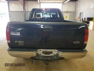 2002 Ford F-150 XL with VIN 1FTRX18L62NA69837, listed as a Copart auction lot 61581935 with 130,078 mi miles and Salvage title. Bid and sale history available at DreamBid. Image 6.