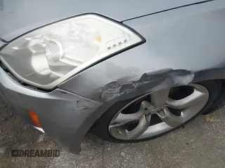 2006 Nissan 350Z Touring z VIN JN1AZ34D56M331590, wystawiony jako IAAI lot #42361928 z przebiegiem Nie podano mil oraz . Historia ofert i sprzedaży dostępna na DreamBid. Obrazek 14.