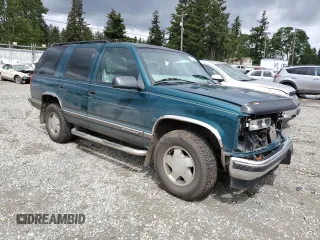 1998 Chevrolet Tahoe z VIN 1GNEK13R2WJ304666, wystawiony jako Copart lot #57833815 z przebiegiem 199 103 mil mil oraz Szkoda całkowita • Salvage title. Historia ofert i sprzedaży dostępna na DreamBid. Obrazek 4.