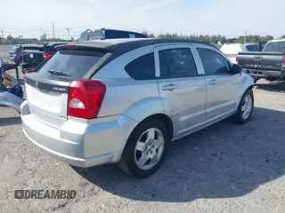 2009 Dodge Caliber SXT with VIN 1B3HB48A39D142674, listed as a IAAI auction lot 41642867 with 156,504 mi miles and . Bid and sale history available at carsss.com. Image 4.