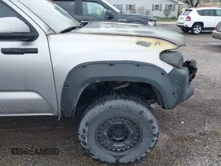 2016 Toyota Tacoma SR with VIN 5TFCZ5AN2GX012937, listed as a IAAI auction lot 41963728 with 157,397 mi miles and . Bid and sale history available at DreamBid. Image 14.