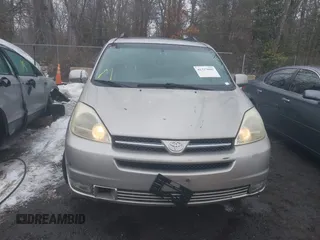 2004 Toyota Sienna XLE z VIN 5TDBA22C74S014781, wystawiony jako IAAI lot #41327692 z przebiegiem 148 548 mil mil oraz . Historia ofert i sprzedaży dostępna na DreamBid. Obrazek 12.