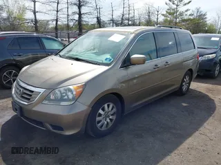 2010 Honda Odyssey EX-L with VIN 5FNRL3H68AB055744, listed as a IAAI auction lot 42107273 with 193,289 mi miles. Bid and sale history available at carsss.com. Image 2.