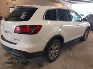 2014 Mazda CX-9 Touring with VIN JM3TB2CA8E0430199, listed as a IAAI auction lot 42090612 with 188,412 mi miles and . Bid and sale history available at carsss.com. Image 4.