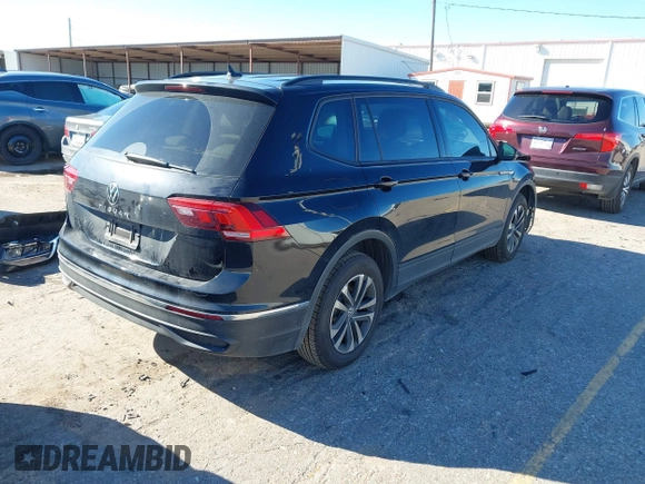2022 Volkswagen Tiguan S with VIN 3VV1B7AX7NM107779, listed as a IAAI auction lot 41210258 with 57,154 mi miles and . Bid and sale history available at DreamBid. Image 4.