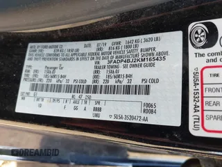 2019 Ford Fiesta SE with VIN 3FADP4BJ2KM165435, listed as a IAAI auction lot 42077508 with 118,784 mi miles. Bid and sale history available at carsss.com. Image 9.