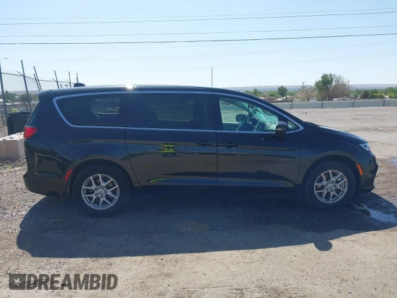 2023 Chrysler Pacifica Touring L with VIN 2C4RC1BG9PR628170, listed as a IAAI auction lot 42515590 with 41,987 mi miles and . Bid and sale history available at DreamBid. Image 13.