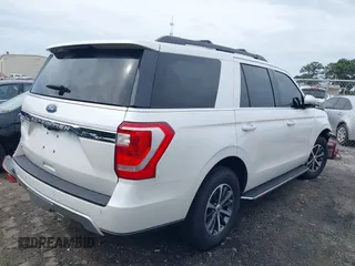 2018 Ford Expedition XLT with VIN 1FMJU1HT9JEA48285, listed as a IAAI auction lot 40282104 with 79,476 mi miles. Bid and sale history available at carsss.com. Image 4.