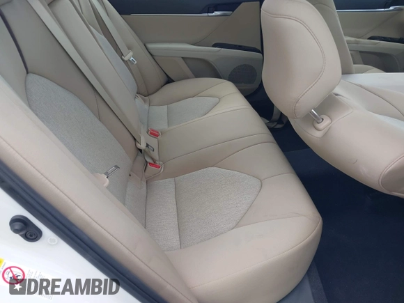 2019 Toyota Camry LE with VIN 4T1B11HK2KU743445, listed as a IAAI auction lot 42129688 with 284,938 mi miles and . Bid and sale history available at DreamBid. Image 8.