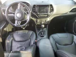 2019 Jeep Cherokee Limited with VIN 1C4PJLDN5KD135764, listed as a Copart auction lot 73637184 with 56,718 mi miles and Salvage Title. Bid and sale history available at DreamBid. Image 8.