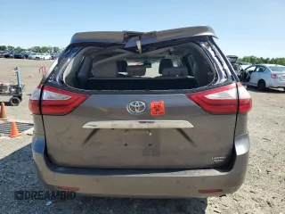 2018 Toyota Sienna XLE с VIN 5TDDZ3DC0JS196792, выставлен на аукционе Copart как лот 57250445 с пробегом 146 479 миль миль и Списание • Salvage title. История ставок и продаж доступна на DreamBid. Изображение 6.