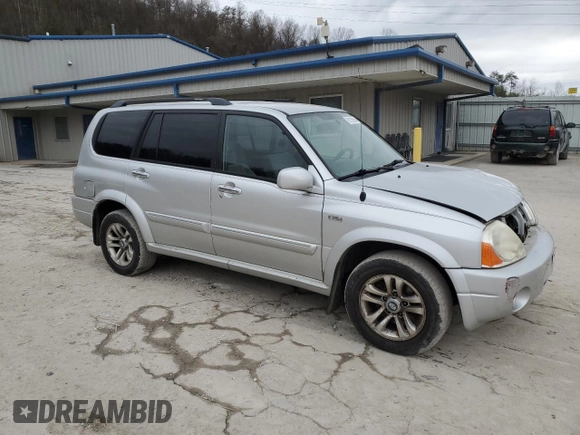 2005 Suzuki XL7 LX with VIN JS3TX92V654108114, listed as a Copart auction lot 81158564 with 130,384 mi miles and Salvage title. Bid and sale history available at DreamBid. Image 4.