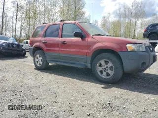 2005 Ford Escape XLT with VIN 1FMYU93195KA54937, listed as a Copart auction lot 52060135 with 95,649 mi miles and Clean Title. Bid and sale history available at carsss.com. Image 4.