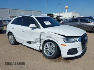 2016 Audi Q3 Premium Plus z VIN WA1EFCFS1GR006694, wystawiony jako IAAI lot #42007479 z przebiegiem 103 901 mil mil oraz . Historia ofert i sprzedaży dostępna na DreamBid. Obrazek 1.