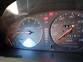 1998 Acura CL Premium z VIN 19UYA2253WL001513, wystawiony jako Copart lot #86998034 z przebiegiem 123 918 mil mil oraz Szkody całkowita. Historia ofert i sprzedaży dostępna na DreamBid. Obrazek 9.