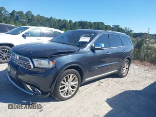 2014 Dodge Durango Citadel with VIN 1C4SDJETXEC390326, listed as a IAAI auction lot 40620779 with 119,537 mi miles and . Bid and sale history available at DreamBid. Image 18.