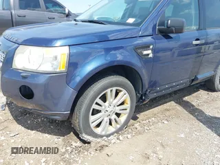 2010 Land Rover LR2 HSE z VIN SALFR2BN7AH176334, wystawiony jako IAAI lot #42094561 z przebiegiem 210 933 mil mil oraz . Historia ofert i sprzedaży dostępna na DreamBid. Obrazek 6.