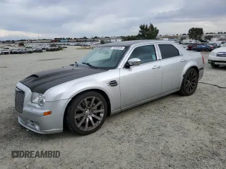 2007 Chrysler 300 C SRT8 with VIN 2C3LA73W07H660214, listed as a Copart auction lot 70283834 with 249,130 mi miles and Salvage Title. Bid and sale history available at carsss.com. Image 1.