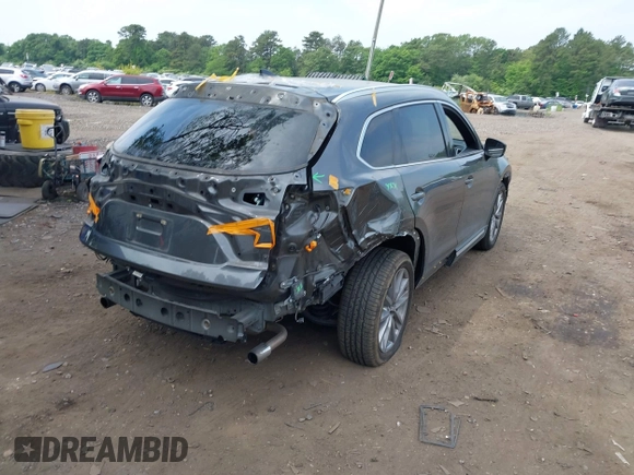 2020 Mazda CX-9 Grand Touring with VIN JM3TCBDY4L0408920, listed as a IAAI auction lot 42325272 with 45,837 mi miles and . Bid and sale history available at DreamBid. Image 4.
