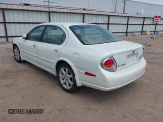 2002 Nissan Maxima GLE z VIN JN1DA31AX2T313083, wystawiony jako IAAI lot #42040751 z przebiegiem 182 814 mil mil oraz . Historia ofert i sprzedaży dostępna na DreamBid. Obrazek 3.