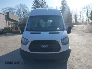 2019 Ford Transit with VIN 1FTBW2XGXKKB14763, listed as a IAAI auction lot 41797636 with 58,122 mi miles and . Bid and sale history available at DreamBid. Image 11.
