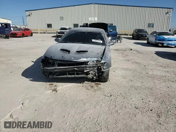 2005 Pontiac GTO z VIN 6G2VX12U45L456331, wystawiony jako Copart lot #45998595 z przebiegiem 86 291 mil mil oraz Szkoda całkowita • Salvage title. Historia ofert i sprzedaży dostępna na DreamBid. Obrazek 10.