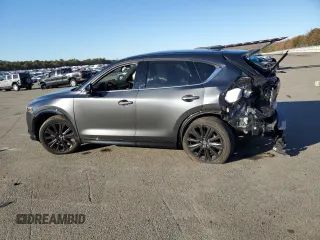 2022 Mazda CX-5 2.5 Turbo with VIN JM3KFBAY2N0596945, listed as a Copart auction lot 86427694 with Not Provided miles and Salvage Title. Bid and sale history available at carsss.com. Image 2.