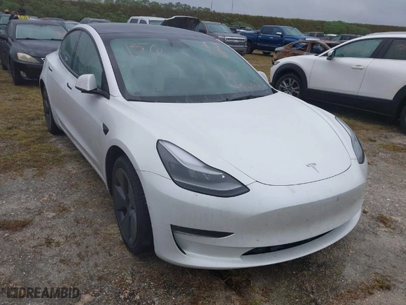 2022 Tesla Model 3 Long Range with VIN 5YJ3E1EBXNF267363, listed as a IAAI auction lot 40494604 with NaN miles. Bid and sale history available at carsss.com. Image 1.