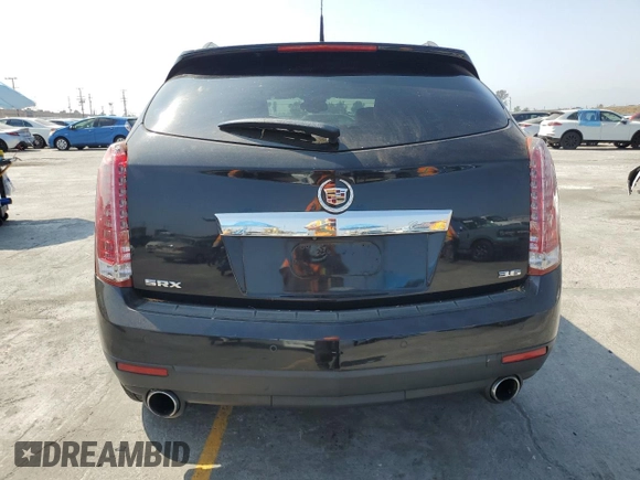 2012 Cadillac SRX Luxury Collection z VIN 3GYFNAE38CS638136, wystawiony jako Copart lot #60292655 z przebiegiem 124 569 mil mil oraz Szkoda całkowita • Salvage title. Historia ofert i sprzedaży dostępna na DreamBid. Obrazek 6.