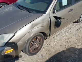 2000 Ford Focus SE with VIN 1FAFP3434YW401903, listed as a IAAI auction lot 42104706 with 201,826 mi miles and . Bid and sale history available at DreamBid. Image 6.