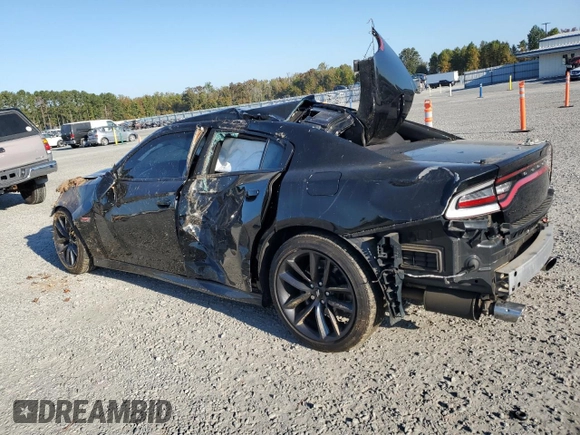 2019 Dodge Charger Scat Pack with VIN 2C3CDXGJ2KH697179, listed as a Copart auction lot 77311144 with 81,789 mi miles and Salvage Title. Bid and sale history available at DreamBid. Image 2.