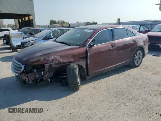 2015 Ford Taurus SEL with VIN 1FAHP2E96FG161735, listed as a Copart auction lot 61865294 with 148,070 mi miles and Salvage Title. Bid and sale history available at DreamBid. Image 1.