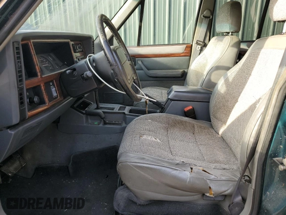 1996 Jeep Cherokee Country with VIN 1J4FJ78S9TL252803, listed as a Copart auction lot 49278184 with 180,420 mi miles and Clean Title. Bid and sale history available at carsss.com. Image 7.