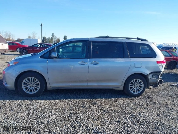 2012 Toyota Sienna XLE AAS with VIN 5TDYK3DC3CS240213, listed as a IAAI auction lot 41522822 with 147,903 mi miles. Bid and sale history available at carsss.com. Image 15.