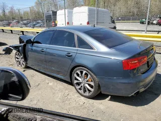 2014 Audi A6 Prestige z VIN WAUHGAFCXEN115962, wystawiony jako Copart lot #52228395 z przebiegiem 134 622 mil mil oraz Szkoda całkowita • Salvage title. Historia ofert i sprzedaży dostępna na DreamBid. Obrazek 2.