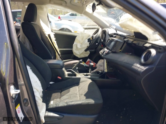 2018 Toyota RAV4 LE with VIN JTMBFREV0JJ722483, listed as a IAAI auction lot 41982973 with 83,012 mi miles. Bid and sale history available at carsss.com. Image 5.