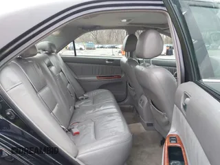 2004 Toyota Camry LE with VIN 4T1BF32K84U074364, listed as a IAAI auction lot 41479264 with 265,865 mi miles. Bid and sale history available at carsss.com. Image 8.