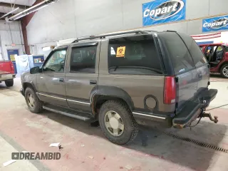 1998 Chevrolet Tahoe z VIN 1GNEK13R0WJ302401, wystawiony jako Copart lot #47196925 z przebiegiem 202 595 mil mil oraz Szkoda całkowita • Salvage title. Historia ofert i sprzedaży dostępna na DreamBid. Obrazek 2.