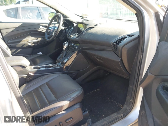 2016 Ford Escape Titanium with VIN 1FMCU9J97GUB91966, listed as a IAAI auction lot 42378829 with 121,218 mi miles and . Bid and sale history available at DreamBid. Image 5.