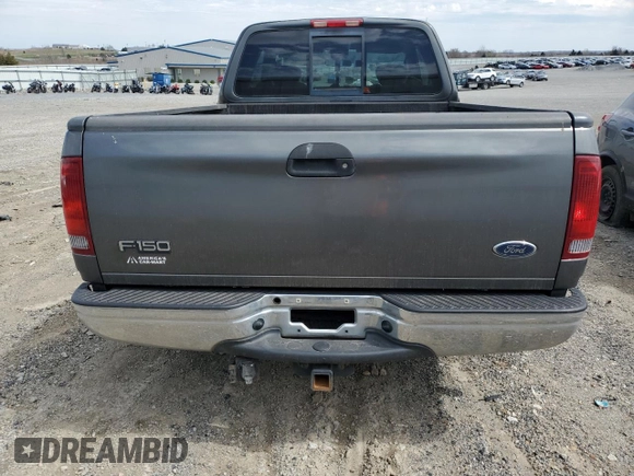 2003 Ford F-150 XL with VIN 1FTRX17L43NA66874, listed as a Copart auction lot 50741395 with 196,161 mi miles and Salvage title. Bid and sale history available at DreamBid. Image 6.