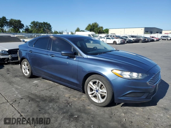 2018 Ford Fusion SE z VIN 3FA6P0H7XJR110391, wystawiony jako Copart lot #58069735 z przebiegiem 168 222 mil mil oraz Szkoda całkowita • Salvage title. Historia ofert i sprzedaży dostępna na DreamBid. Obrazek 4.