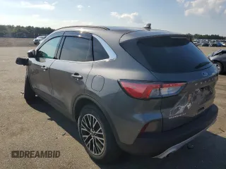 2021 Ford Escape Titanium Plug-In Hybrid z VIN 1FMCU0LZ1MUB17737, wystawiony jako Copart lot #57162592 z przebiegiem Nie podano mil oraz . Historia ofert i sprzedaży dostępna na DreamBid. Obrazek 3.