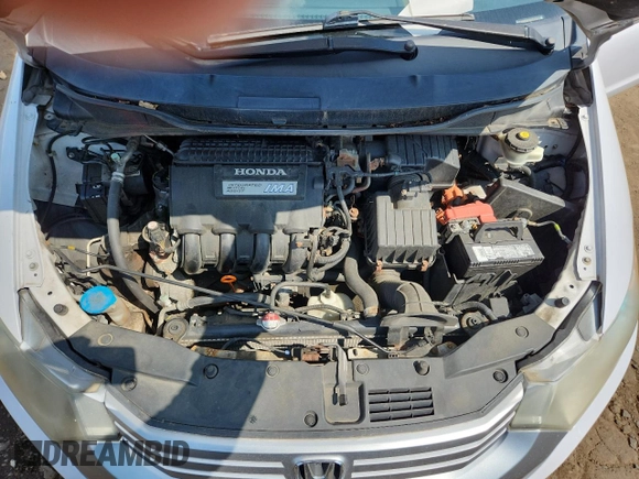 2010 Honda Insight EX с VIN JHMZE2H75AS024918, выставлен на аукционе Copart как лот 66526265 с пробегом 312 605 миль миль и Списание • Salvage title. История ставок и продаж доступна на DreamBid. Изображение 11.