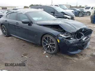 2021 BMW 8 Series M850i with VIN WBAGV8C03MCG68700, listed as a IAAI auction lot 41684696 with 18,516 mi miles. Bid and sale history available at carsss.com. Image 1.