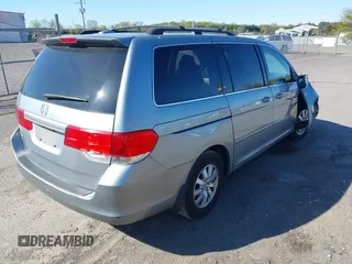 2009 Honda Odyssey EX-L with VIN 5FNRL38729B032786, listed as a IAAI auction lot 42012590 with 188,552 mi miles. Bid and sale history available at carsss.com. Image 4.