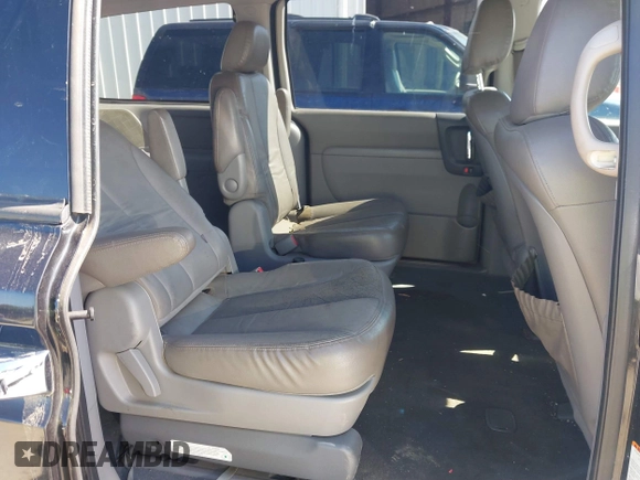 2011 Kia Sedona EX with VIN KNDMH4C76B6398261, listed as a IAAI auction lot 41894696 with 180,297 mi miles. Bid and sale history available at carsss.com. Image 8.