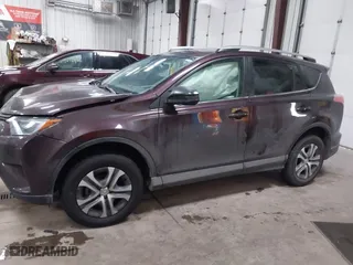 2018 Toyota RAV4 LE with VIN 2T3BFREVXJW737378, listed as a IAAI auction lot 41355320 with 58,609 mi miles. Bid and sale history available at carsss.com. Image 14.