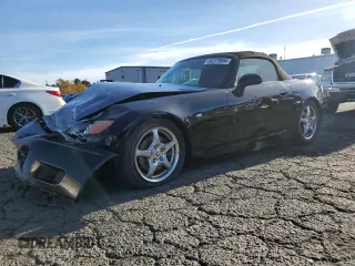 2003 Honda S2000 with VIN JHMAP11493T007487, listed as a Copart auction lot 80379894 with 148,954 mi miles and Salvage Title. Bid and sale history available at DreamBid. Image 1.