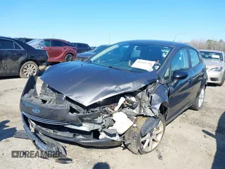 2019 Ford Fiesta SE with VIN 3FADP4EJ1KM105769, listed as a IAAI auction lot 41649748 with 88,647 mi miles. Bid and sale history available at carsss.com. Image 2.