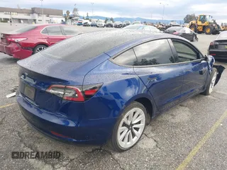 2023 Tesla Model 3 with VIN 5YJ3E1EA0PF518983, listed as a IAAI auction lot 41749225 with 26,748 mi miles and . Bid and sale history available at DreamBid. Image 4.